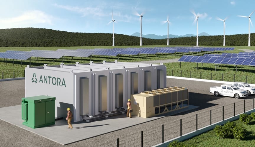 Workers are shown at an industrial structure containing 6 graphite blocks that is sited at wind and solar farm
