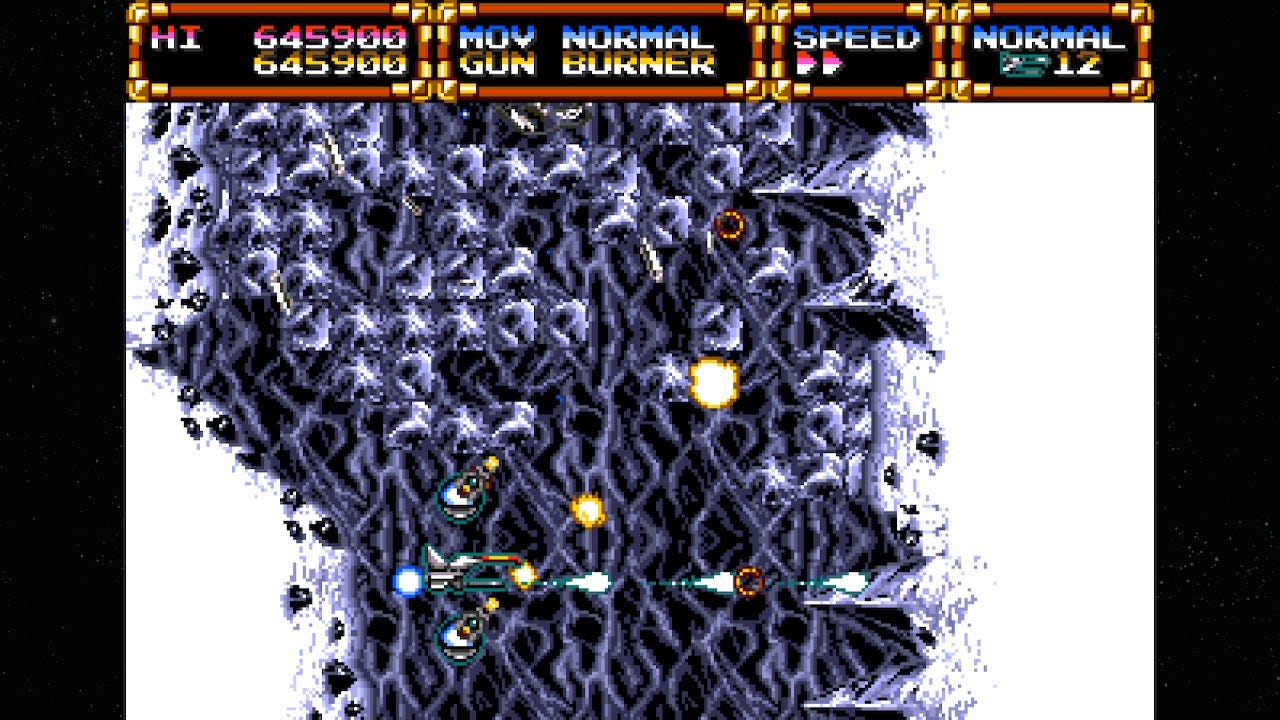 The Gleylancer moves vertically through a tunnel full of obstacles that must be blasted away by its movers.