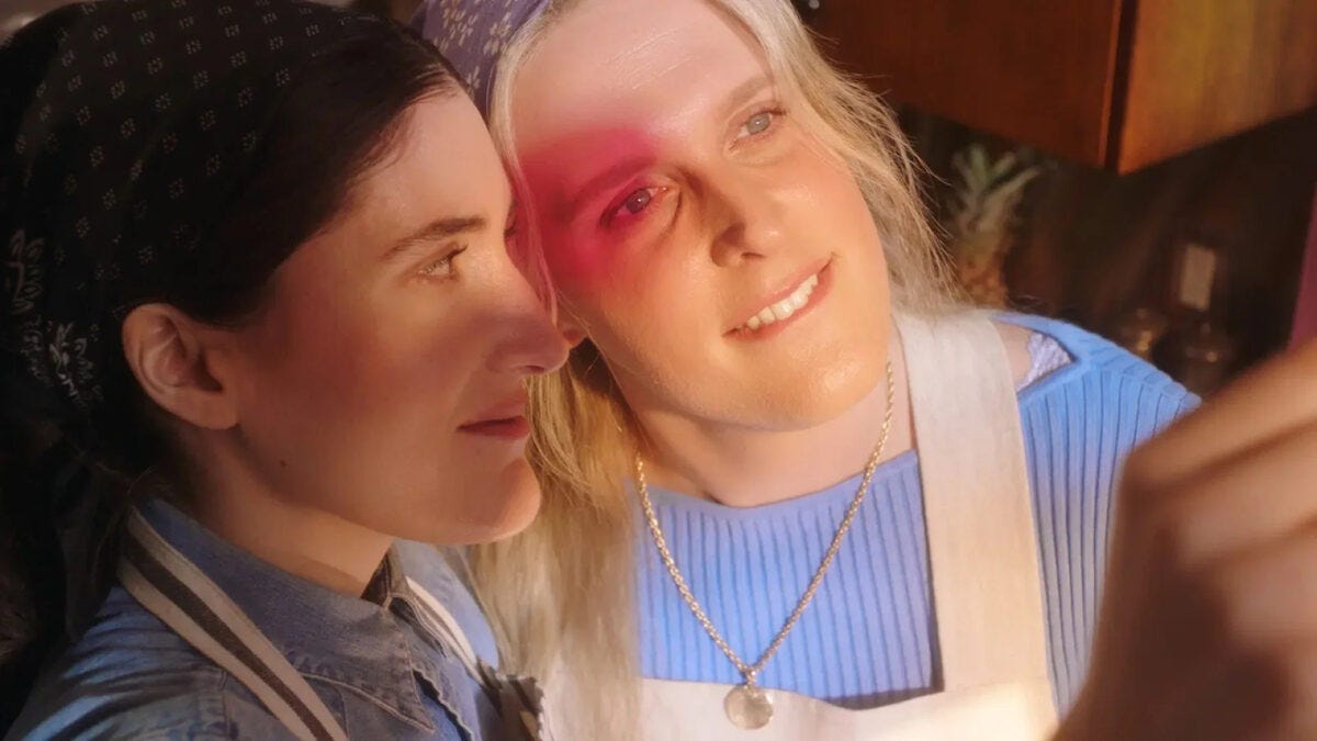 a still from maddie's secret showing john early as maddie and kate berlant as her obsessed friend looking gorgeous