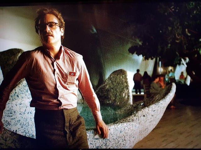 r/MovieDetails - In Her (2013), Theodore puts a safety pin in his shirt so Sam can see over the top of his pocket through his phone camera.