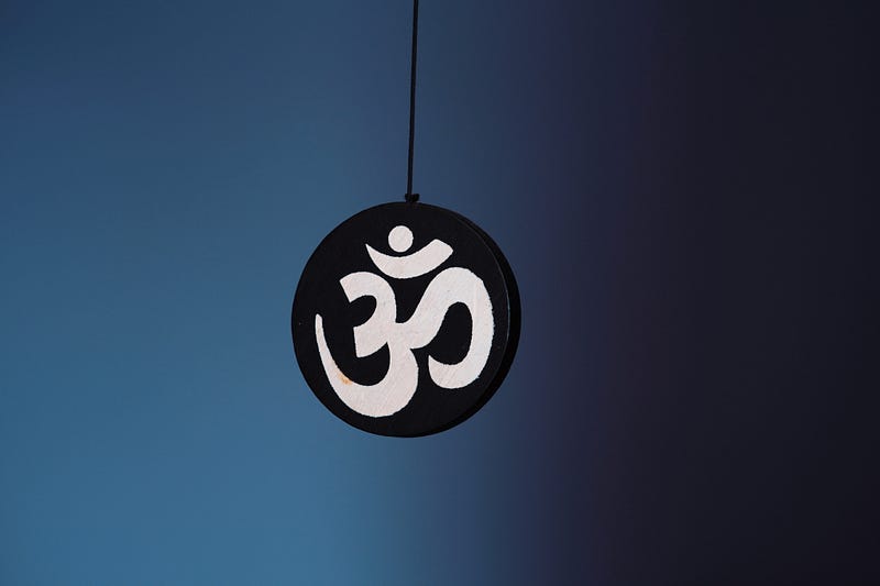 Om — combining अ (a) with उ (u) and the chandrabindu (ँ, ṃ). Om — combining अ (a) with उ (u) and the chandrabindu (ँ, ṃ).