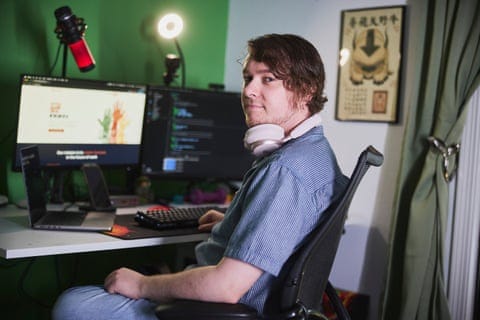 a man sitting down 