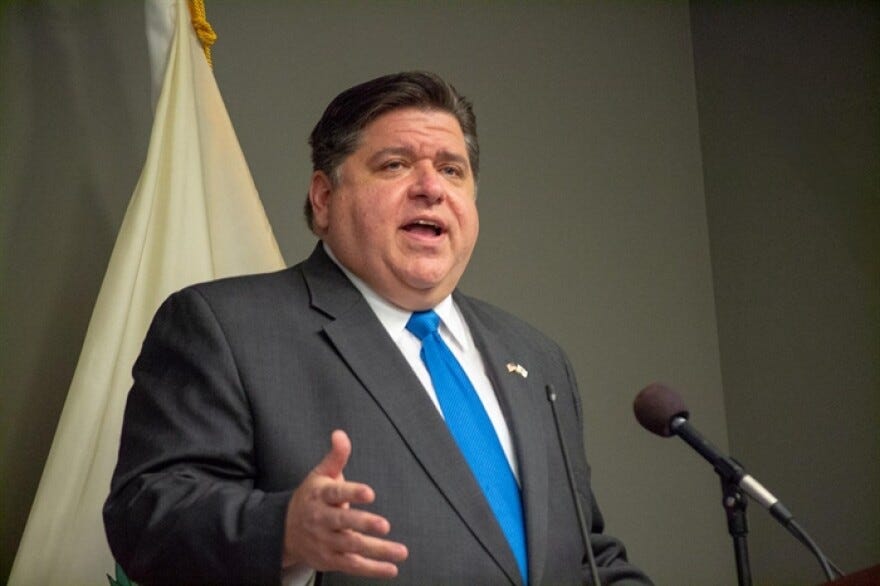 Illinois governor JB Pritzker at podium