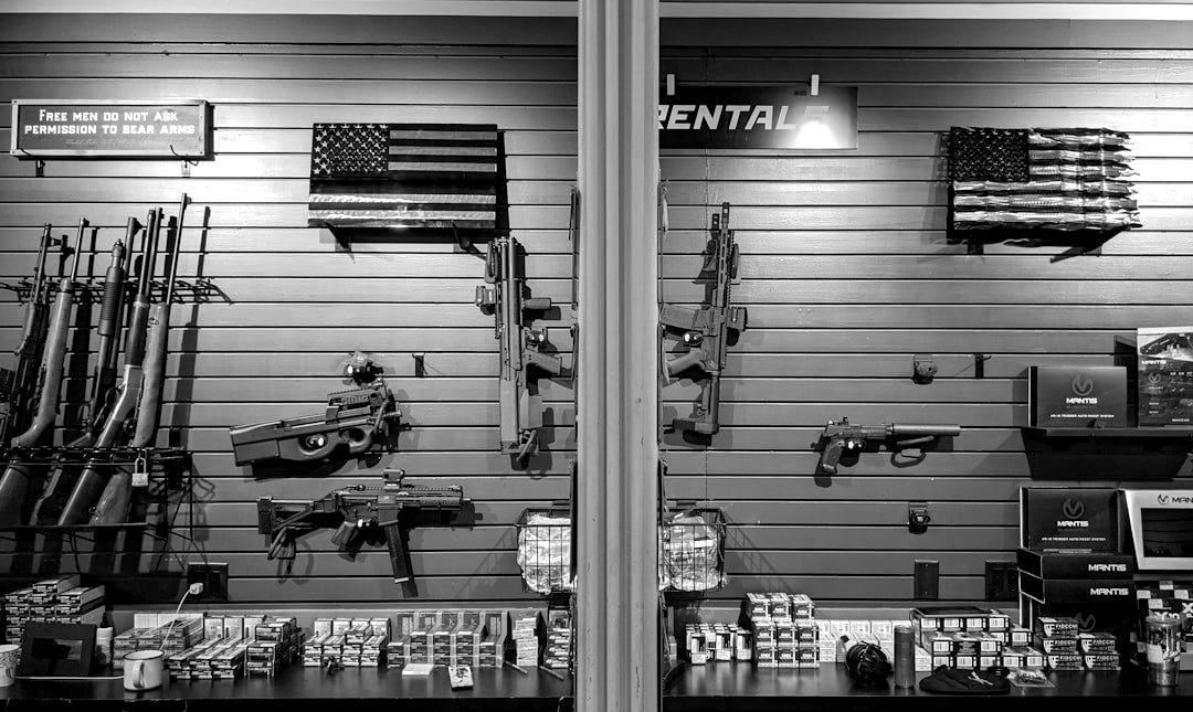 a display of guns and guns in a gun shop a display of guns and guns in a gun shop