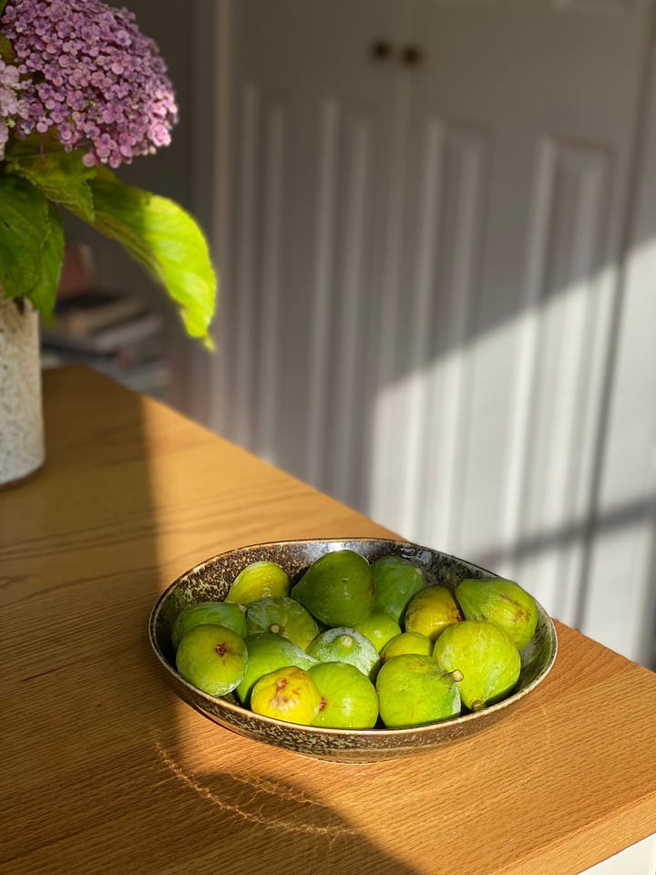 A bowl of fresh figs and a fig salad