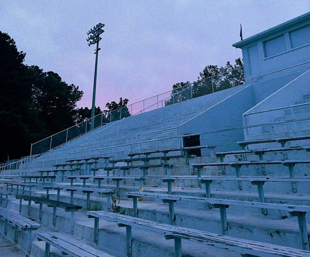 a row of empty bleachers sitting next to each other