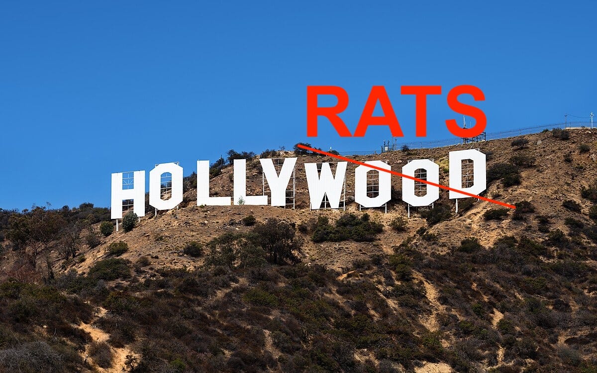 Hollywood sign with "wood" crossed out and "rats" written over the top