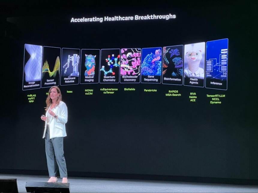 A person standing on a stage

AI-generated content may be incorrect.