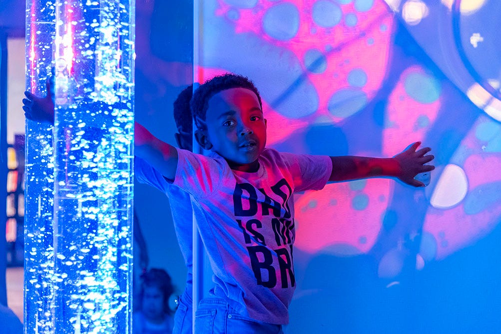 Young boy experiencing the The projector, bubble, and hurricane tubes are some of the most popular elements in the Multi Sensory Environment located at Durham County Main Library. Young boy experiencing the The projector, bubble, and hurricane tubes are some of the most popular elements in the Multi Sensory Environment located at Durham County Main Library.