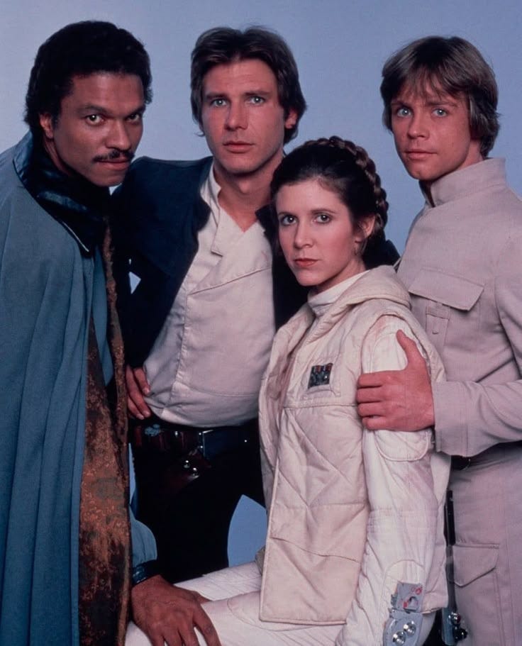 This may contain: the cast of star wars posing for a photo This may contain: the cast of star wars posing for a photo