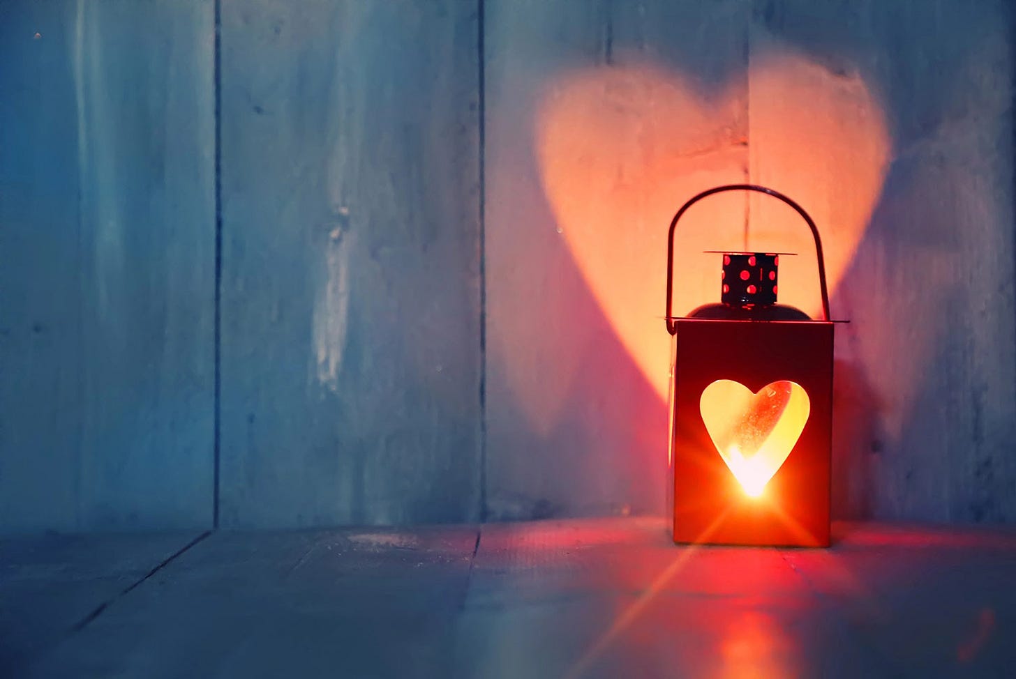Lantern with light inside in the shape of a heart