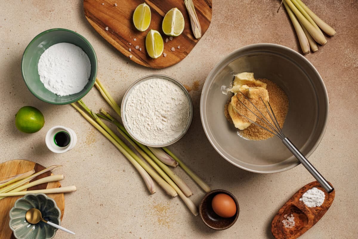 Creaming butter in a large bowl with sugar and other ingredients for a lemongrass cookiesies.