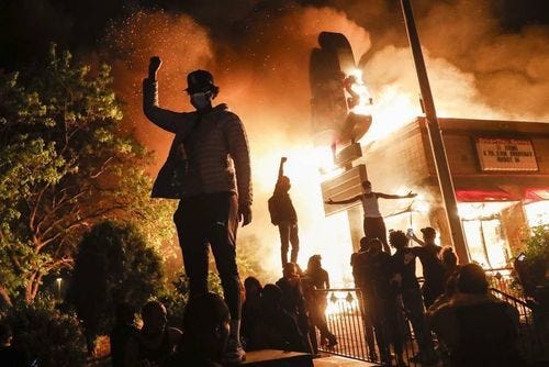 r/Bestofprotests - Impressive picture of an Arby’s burning in Minneapolis | by John Minchillo