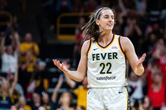 May be an image of basketball and text that says 'Lny FEVER 22 salesforce' May be an image of basketball and text that says 'Lny FEVER 22 salesforce'