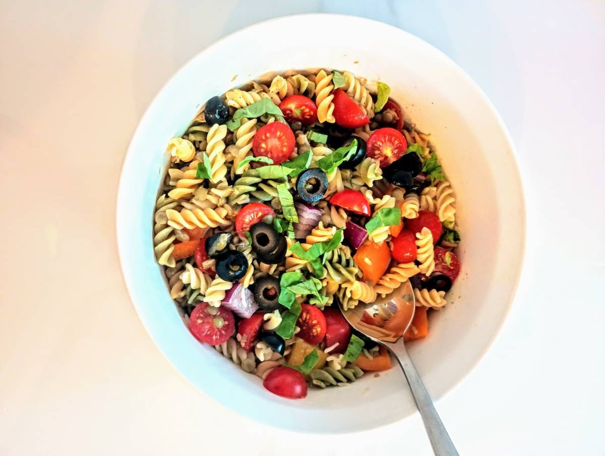 lentil pasta salad in bowl.