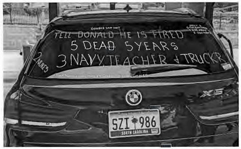 Text on windows of suspect's vehicle