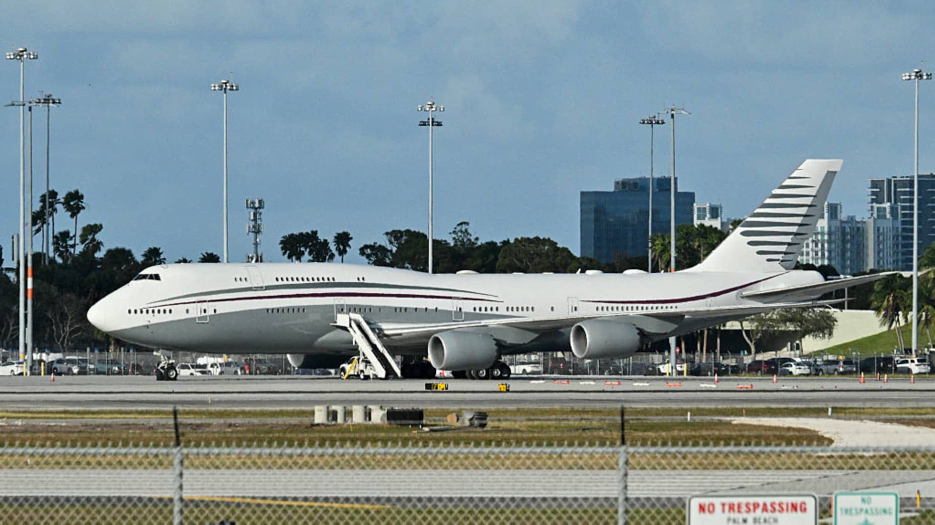 In this February 15, 2025 a Boeing 747 sits on the tarmac of Palm Beach International airport after US President Donald Trump toured the aircraft on February 15, 2025. Donald Trump plans to accept a luxury Boeing jet from the Qatari royal family for use as Air Force One and then continue flying in it after his tenure, despite strict rules on US presidential gifts, media reported May 11, 2025. Calling the plane a "flying palace," ABC News, which first reported the story, said the Boeing 747-8 jumbo jet would In this February 15, 2025 a Boeing 747 sits on the tarmac of Palm Beach International airport after US President Donald Trump toured the aircraft on February 15, 2025. Donald Trump plans to accept a luxury Boeing jet from the Qatari royal family for use as Air Force One and then continue flying in it after his tenure, despite strict rules on US presidential gifts, media reported May 11, 2025. Calling the plane a "flying palace," ABC News, which first reported the story, said the Boeing 747-8 jumbo jet would