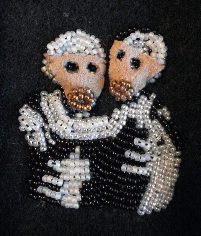 Beaded Banksy hugging skeletons skull. Gas Masks WWIII Beaded Banksy hugging skeletons skull. Gas Masks WWIII
