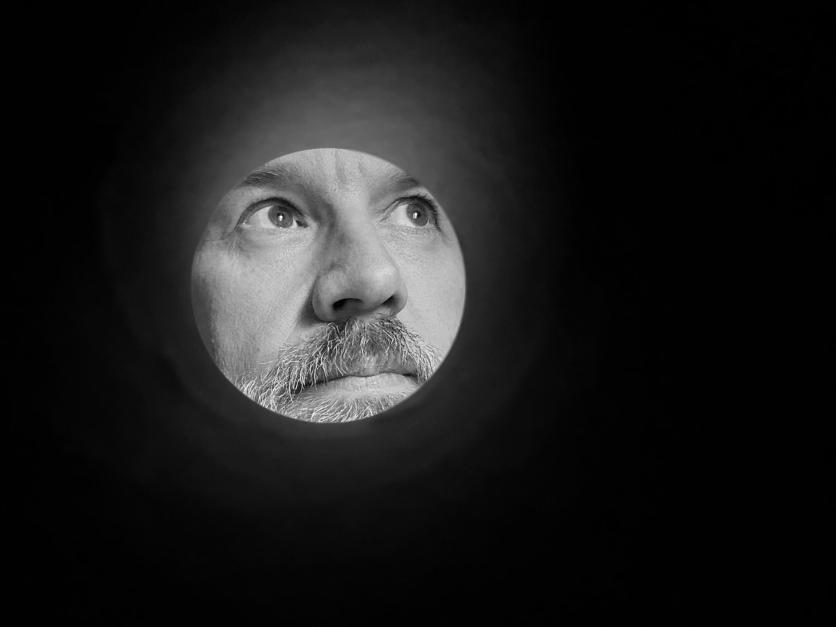 A selfie taken through a toilet roll