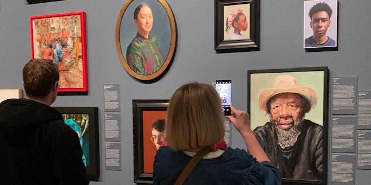 People watching at the Laing's brace of portrait exhibitions