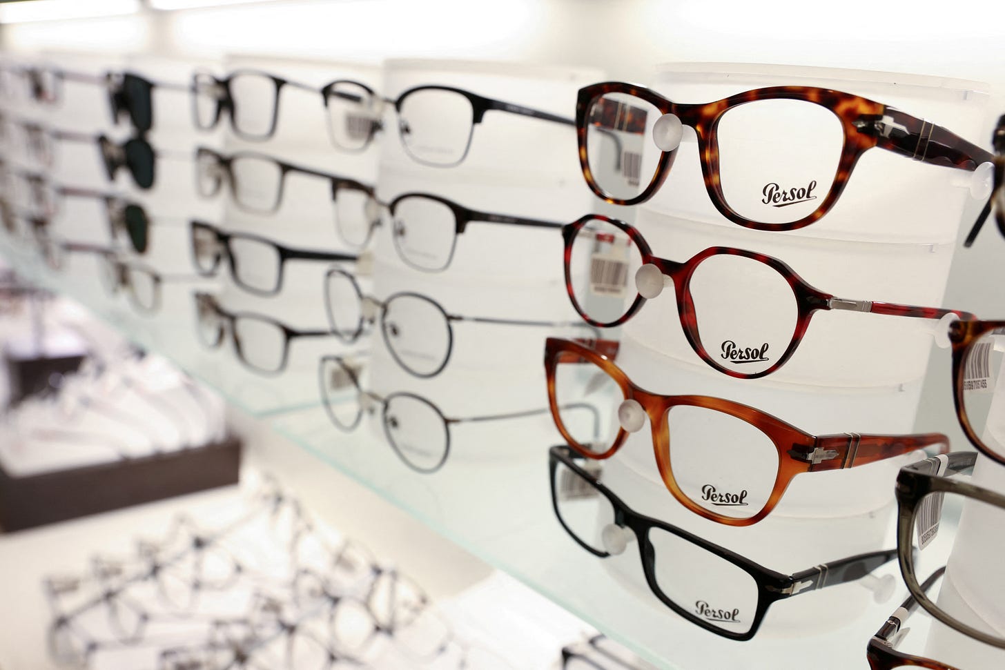 Persol glasses are pictured for sale in a LensCrafters, both brands owned by EssilorLuxottica SA, in Manhattan, New York City