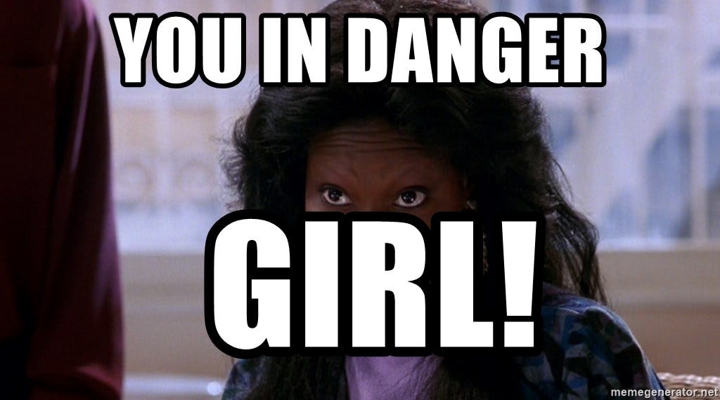 Text overlay on screen grab from GHOST 2 featuring Whoopi Goldberg that says “You in Danger, Girl!”