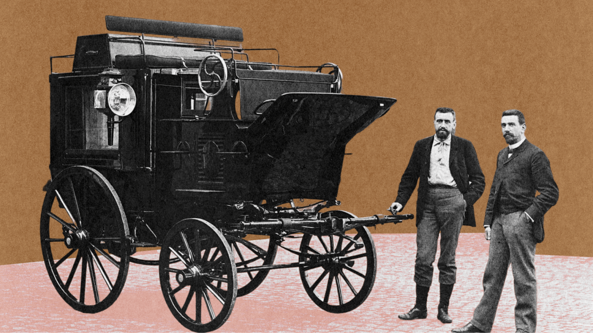 Two men stand beside an early D'Ieteren motor vehicle with large wheels and a lamp, set against a brown and pink background.
