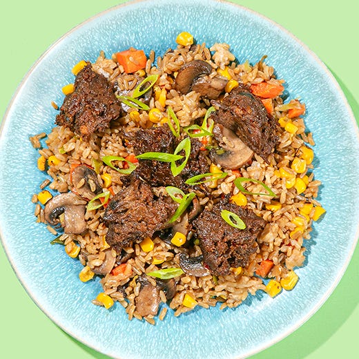 Purple Carrot's General Tso's Shiitake Protein, Chevre-Stuffed Peaches, Enchiladas Mole, and Artichoke Cavatappi Alfredo