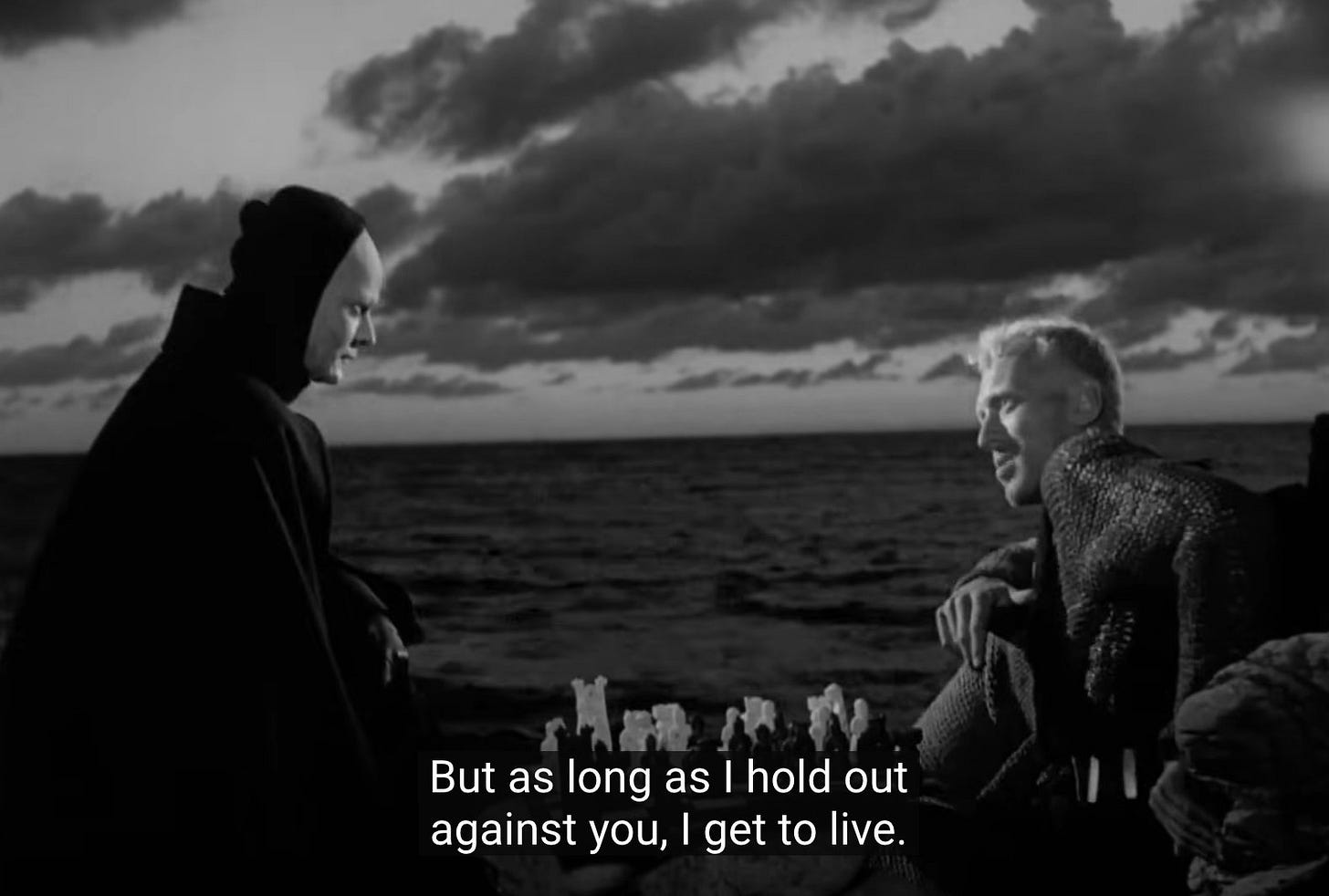 May be a black-and-white image of 2 people and text that says 'But as long as I hold out out against you, get to live.'