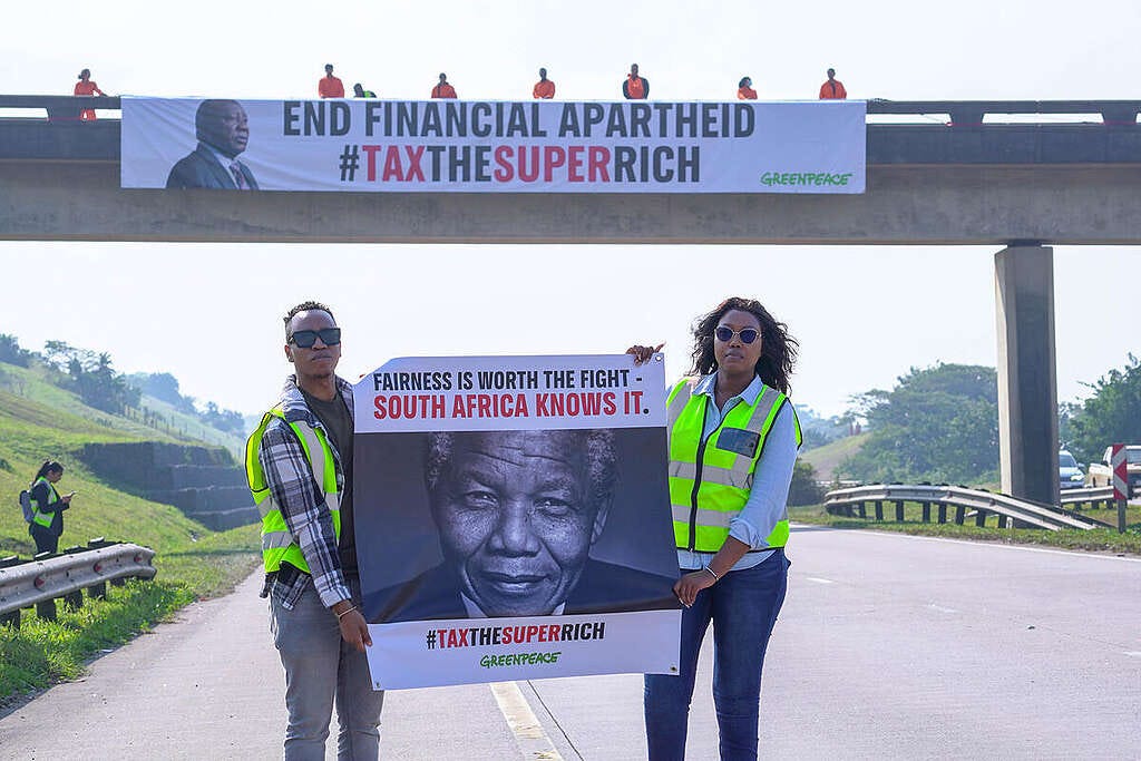 "End Financial Apartheid" Action in Durban, South Africa. © Chanho Kondolo / Greenpeace