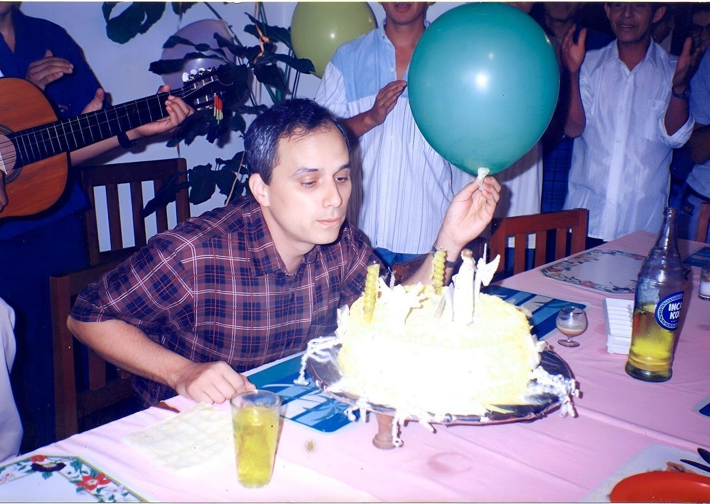 Robert Prevost blowing out candles on a birthday cake at a gathering in Peru Robert Prevost blowing out candles on a birthday cake at a gathering in Peru