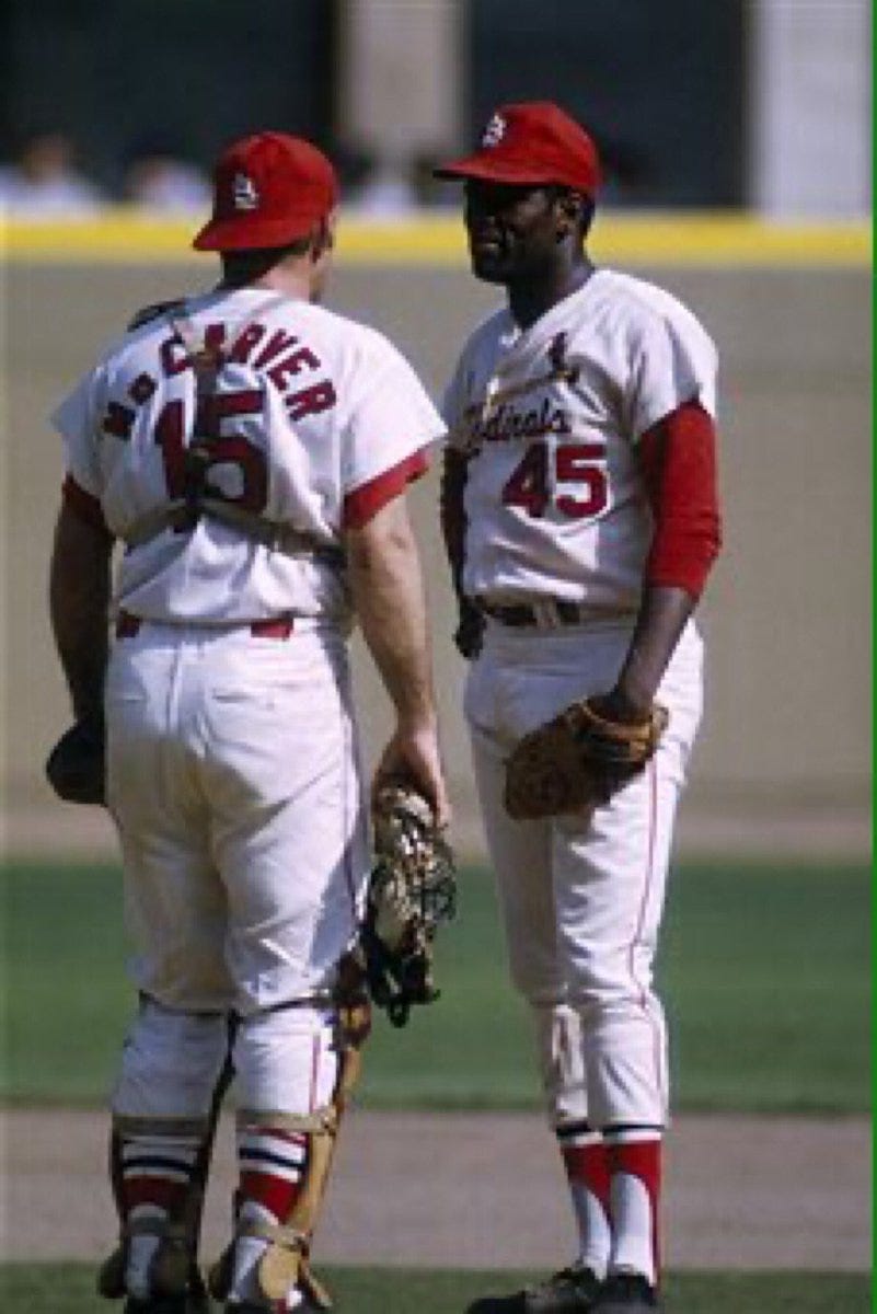 Old Days”Bob Gibson and Tim McCarver have a brief conference during the 1968  Tiger-Cardinals World Series in St.Louis #STLCards #StLouis #Tigers  #Detroit #MLB #1960s