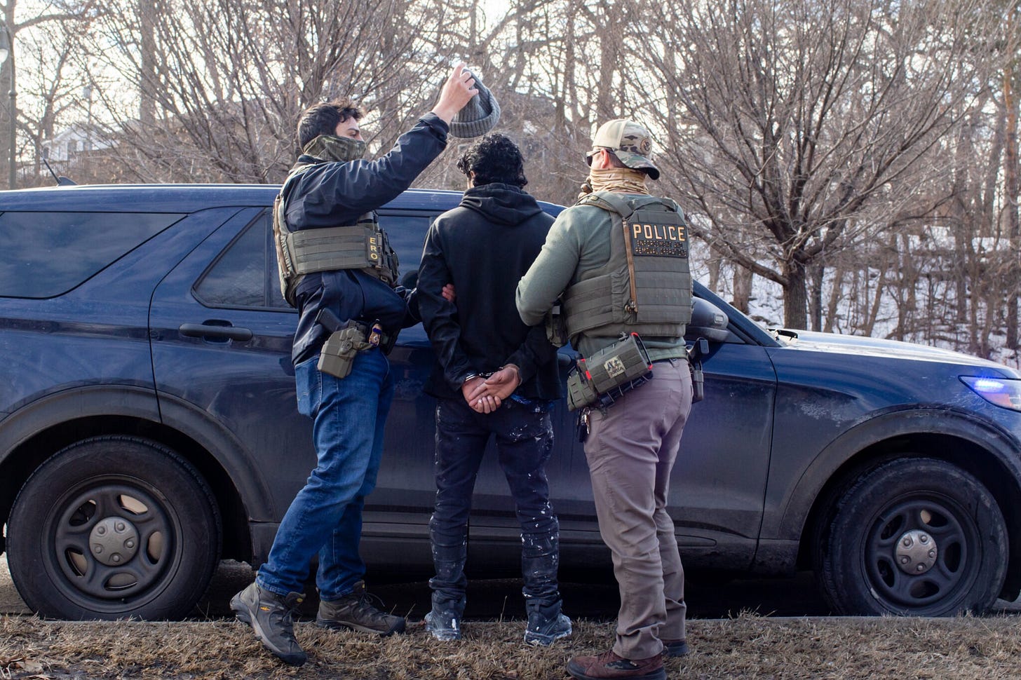 ICE agents search the passenger of a truck as they arrest both him and the driver during a traffic stop on Feb. 11, 2026, in Robbinsdale, Minnesota. (Photo by Nicole Neri/Minnesota Reformer) ICE agents search the passenger of a truck as they arrest both him and the driver during a traffic stop on Feb. 11, 2026, in Robbinsdale, Minnesota. (Photo by Nicole Neri/Minnesota Reformer)