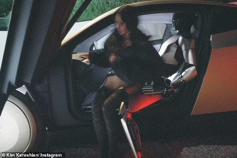 Kim Kardashian's photoshoot with Elon Musk's Tesla Bot.