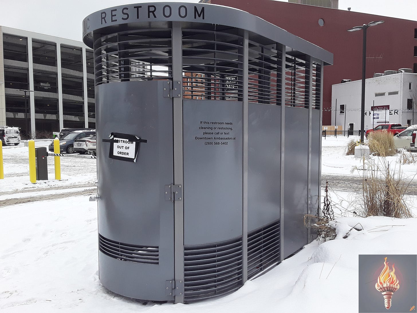 The single existing, open-to-the-public Portland Loo in Kalamazoo. It's located at 108 E. Water St., in the northwest corner of the Haymarket parking lot. A sign on the door reads "RESTROOM OUT OF ORDER". The sign has been there since at least Wednesday, January 17, 2024; likely a lot longer. Photograph taken on the afternoon of Thursday, January 18, 2024. The single existing, open-to-the-public Portland Loo in Kalamazoo. It's located at 108 E. Water St., in the northwest corner of the Haymarket parking lot. A sign on the door reads "RESTROOM OUT OF ORDER". The sign has been there since at least Wednesday, January 17, 2024; likely a lot longer. Photograph taken on the afternoon of Thursday, January 18, 2024.