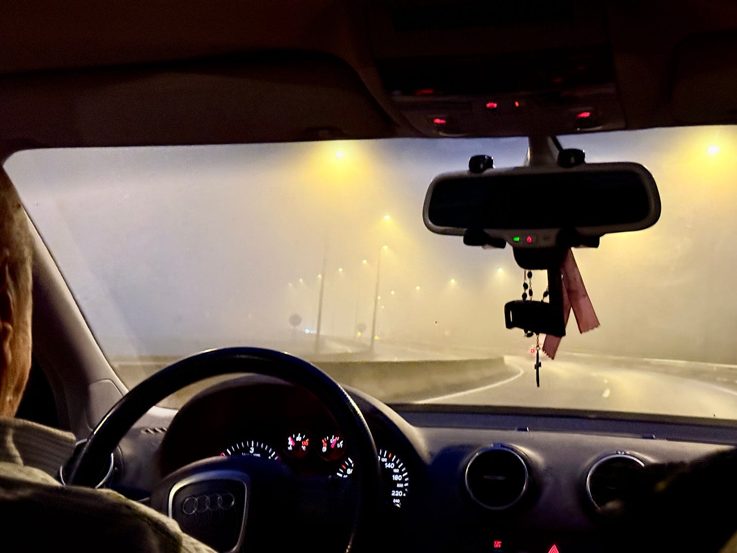 Being driven to the airport by my father-in-law last Saturday