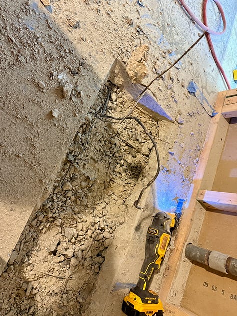 Photo mosaic of concrete being broken up with a jackhammer.