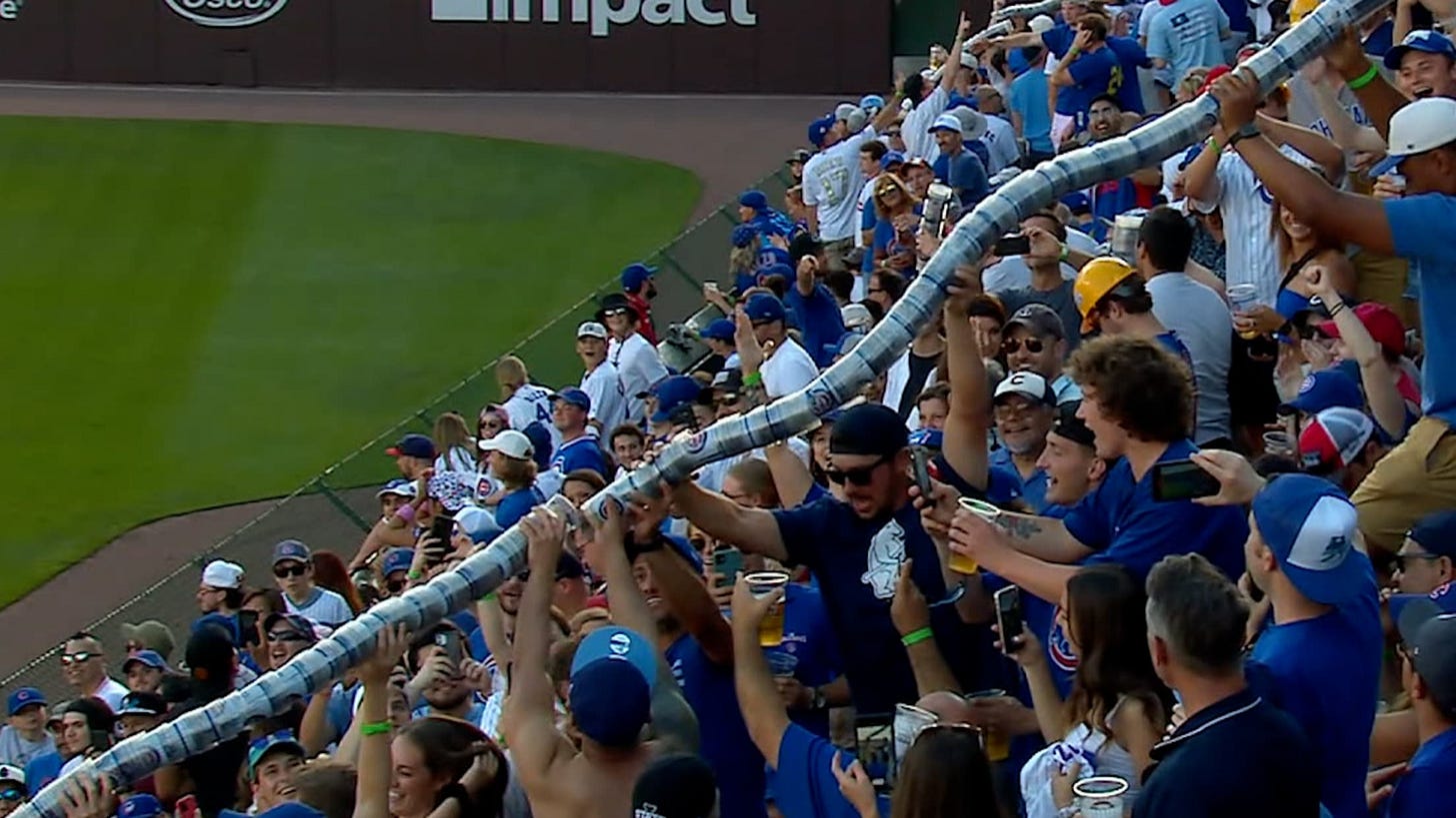Cubs fans make snake of cups