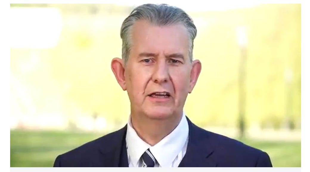 Man in suit with sticky-out ears Man in suit with sticky-out ears