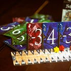 Schadenfreude is a surprising trick-taking game worth the pain