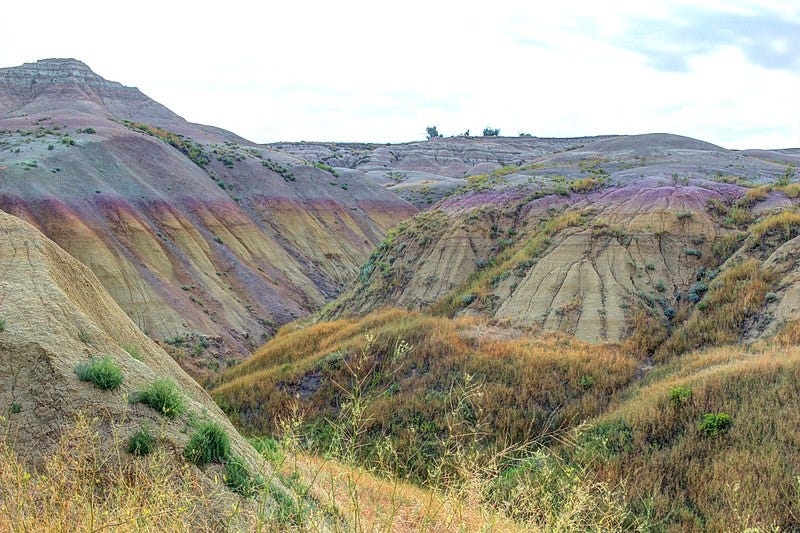 Rainbow-colored rocks of the South Dakota Badlands After Recent Rain Rainbow-colored rocks of the South Dakota Badlands After Recent Rain