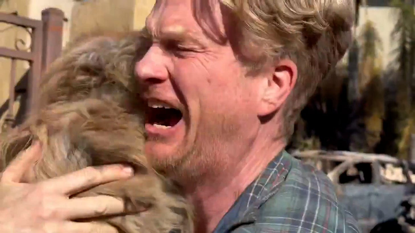 man reunited with missing dogs after la fires