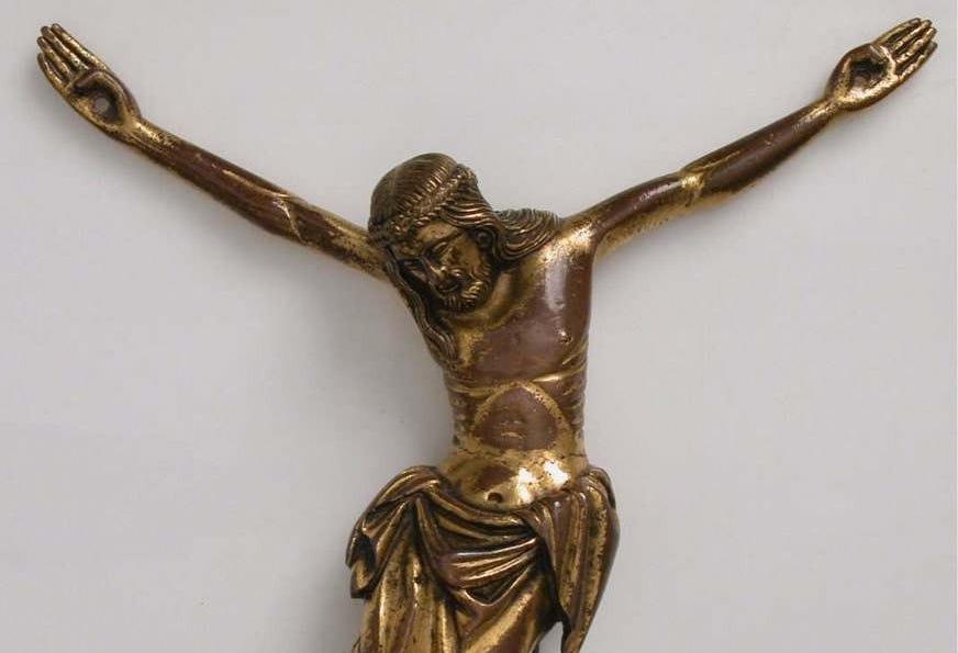 Copper sculpture of crucified Christ