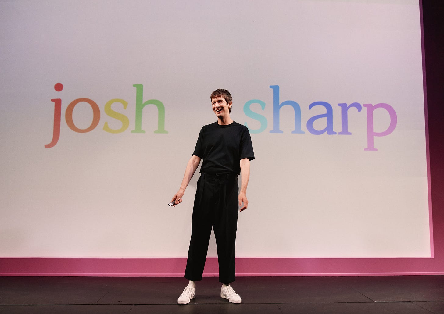 Josh Sharp introduces himself with an appropriately rainbow colored slide in "ta-da!" Josh Sharp introduces himself with an appropriately rainbow colored slide in "ta-da!"