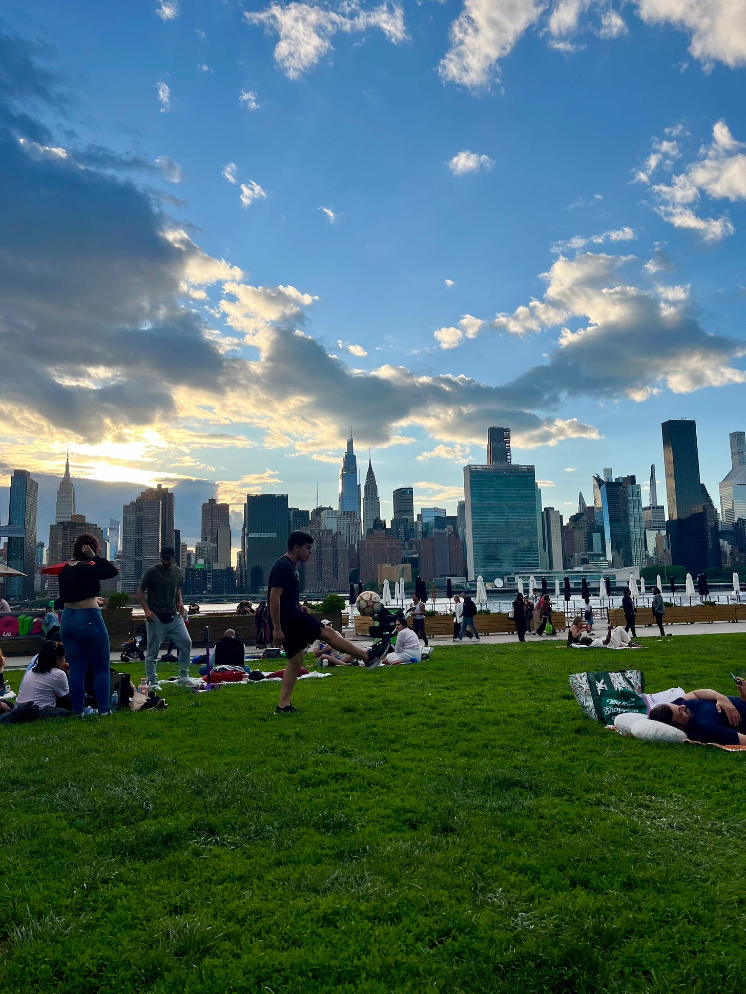 A view of the Manhattan skyline from a park in Queens.