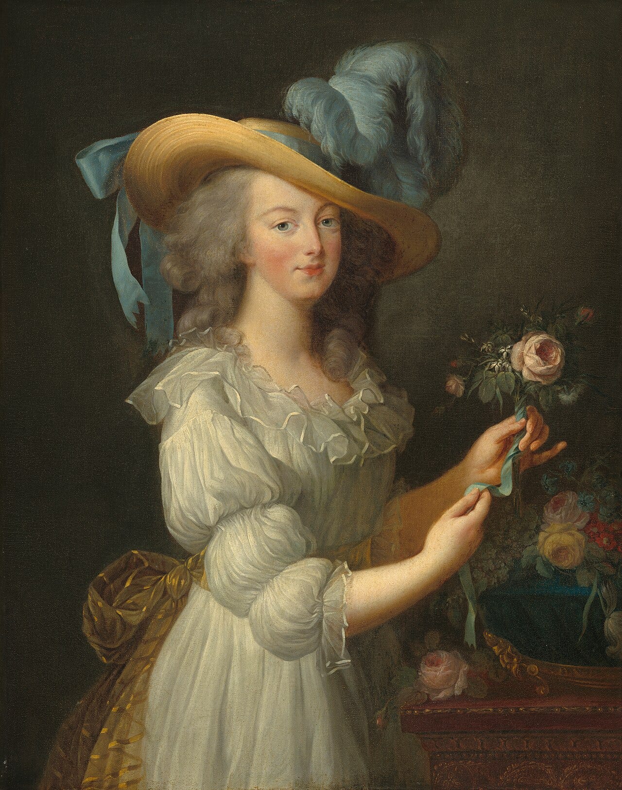 Marie Antoinette in a white muslin dress and straw hat Marie Antoinette in a white muslin dress and straw hat