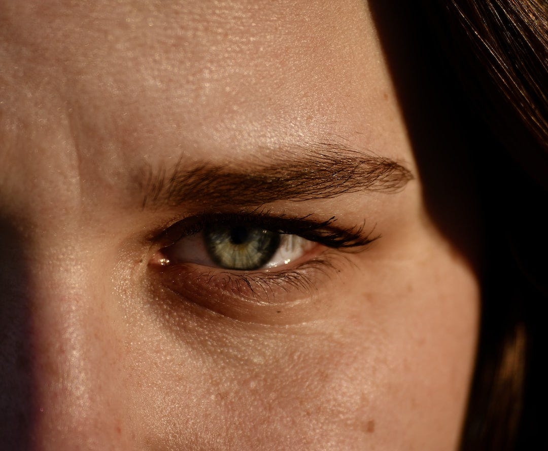 womans eye in close up photography womans eye in close up photography