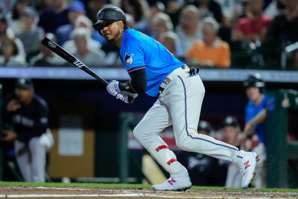 Luis Arraez of the Miami Marlins at bat during a spring training game against the New York Yankees at Roger Dean Stadium on March 04, 2024 in...