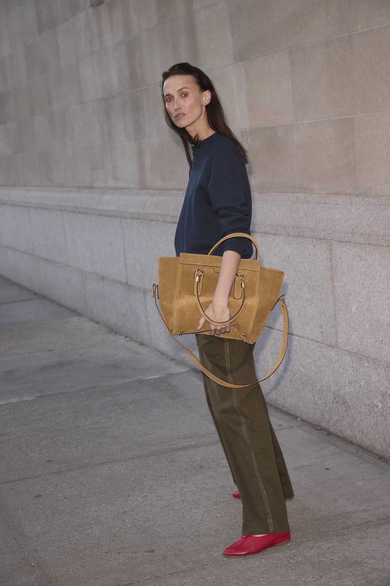 woman in blue shirt with sweater