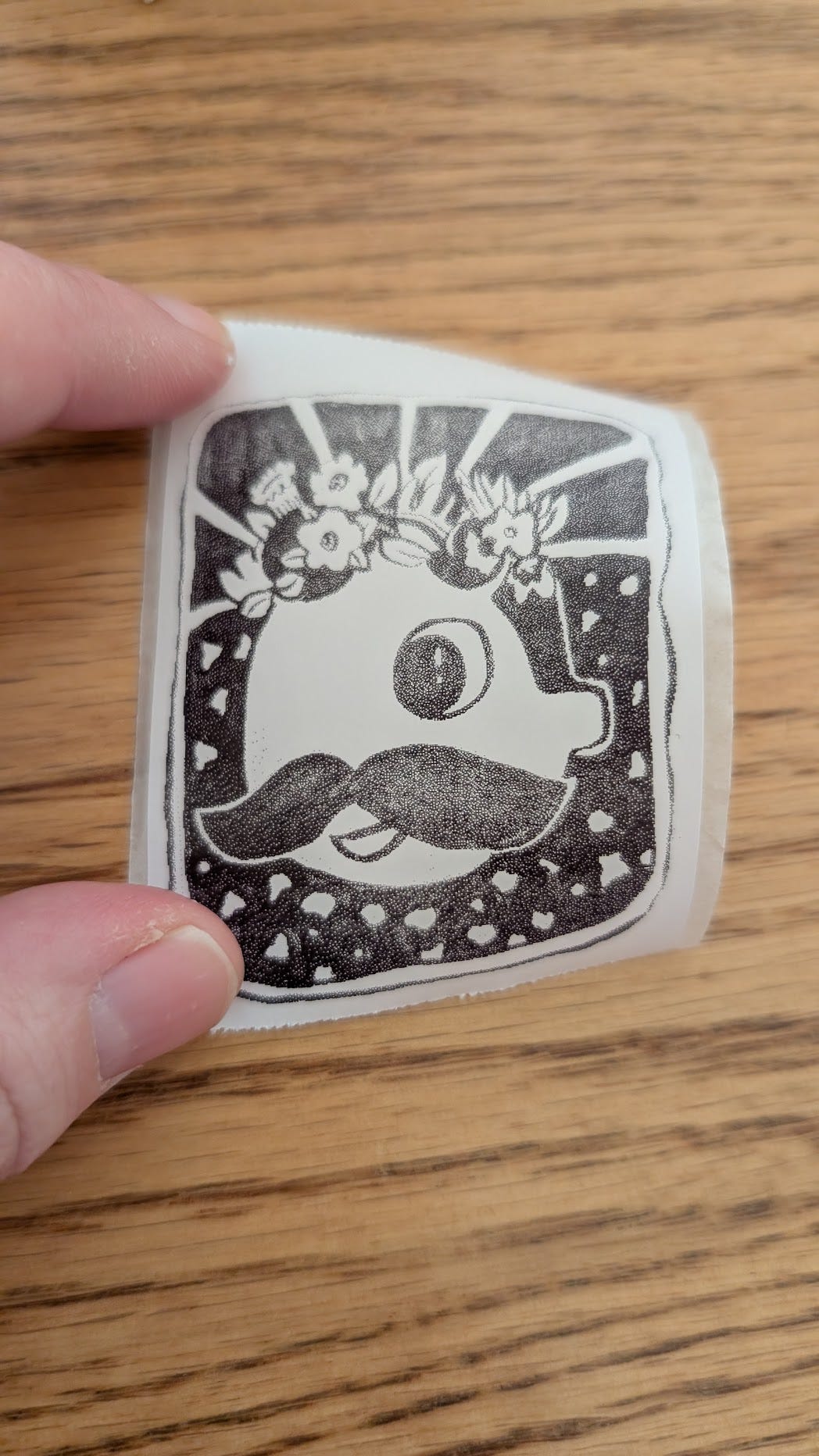 Thermal printed sticker of Natty Boh with flowers on his head